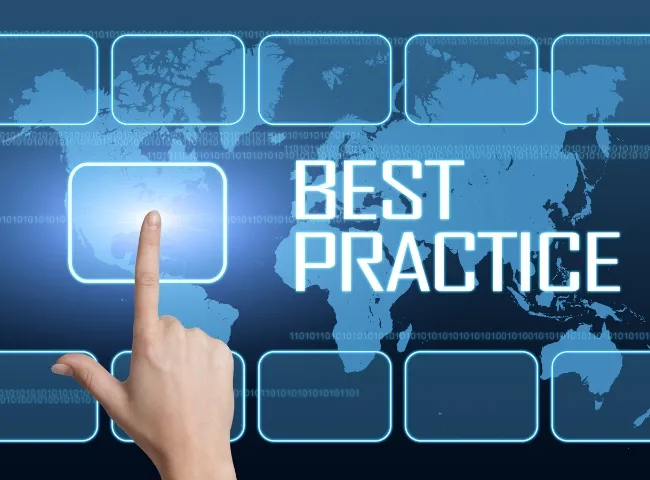 Finger pressing a digital button on a world map interface with the text 'Best Practice'.